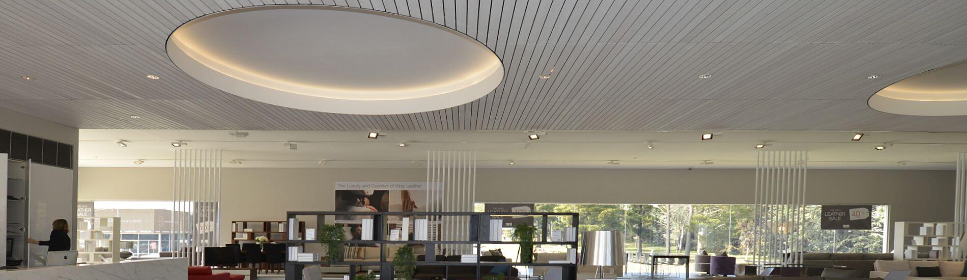 DRIFTWOOD Rustic Timber Slatted Ceiling Denotes Sophisticated Retail Interior Branding