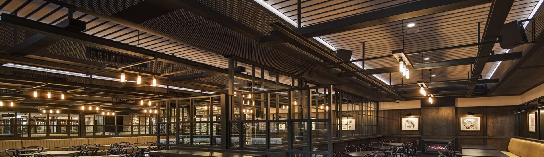 Customised SUPASLAT Slatted Ceilings in DRIFTWOOD Rustic Timber Finishes Creates Mood In Iconic Hotel
