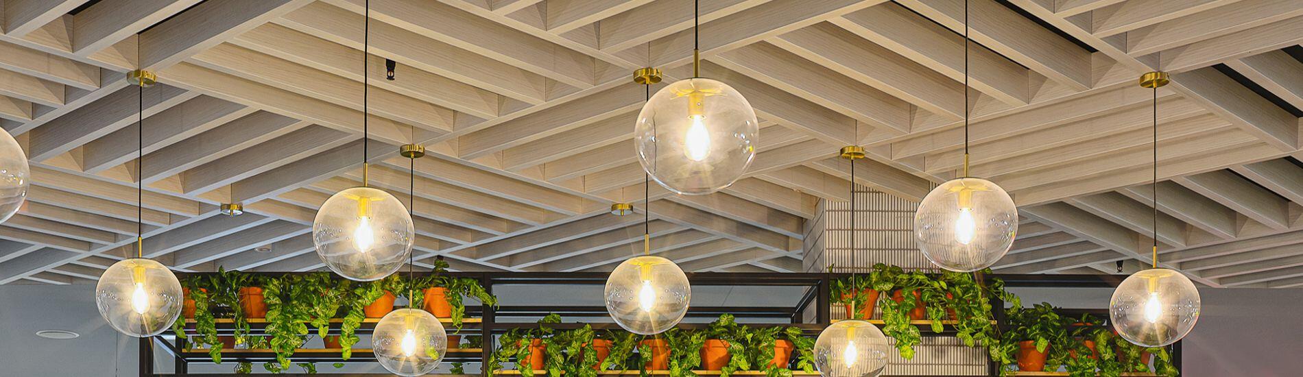 Lightweight MAXI BEAM Creates Basket Weave Effect on Foodcourt Ceiling