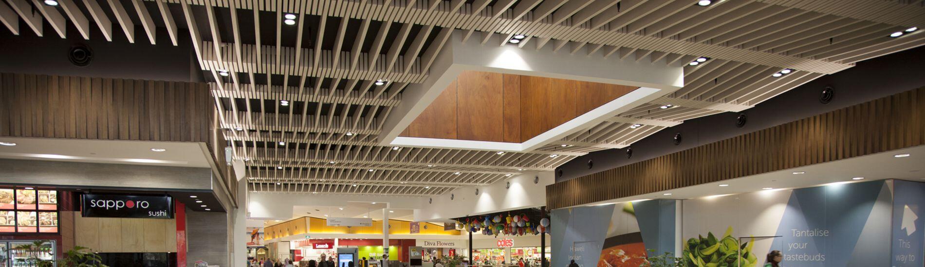 Lightweight MAXI BEAM in Multiple Profiles and Acoustic Option Used Extensively Throughout Shopping Centre