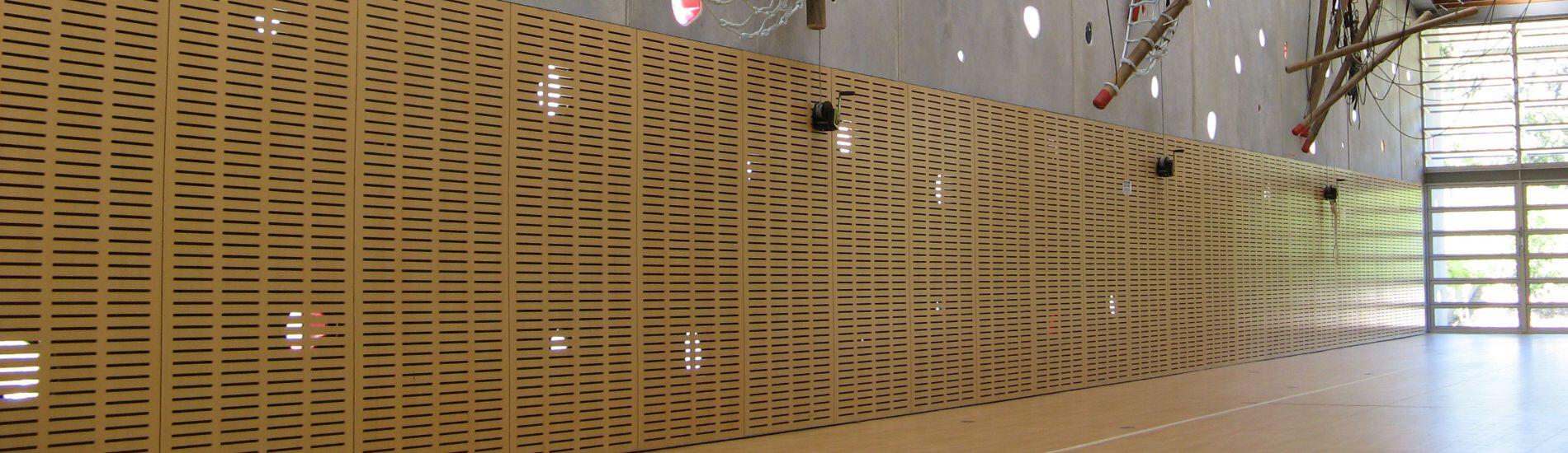 SUPACOUSTIC slotted wall panels provide durable noise reduction solution for sports hall