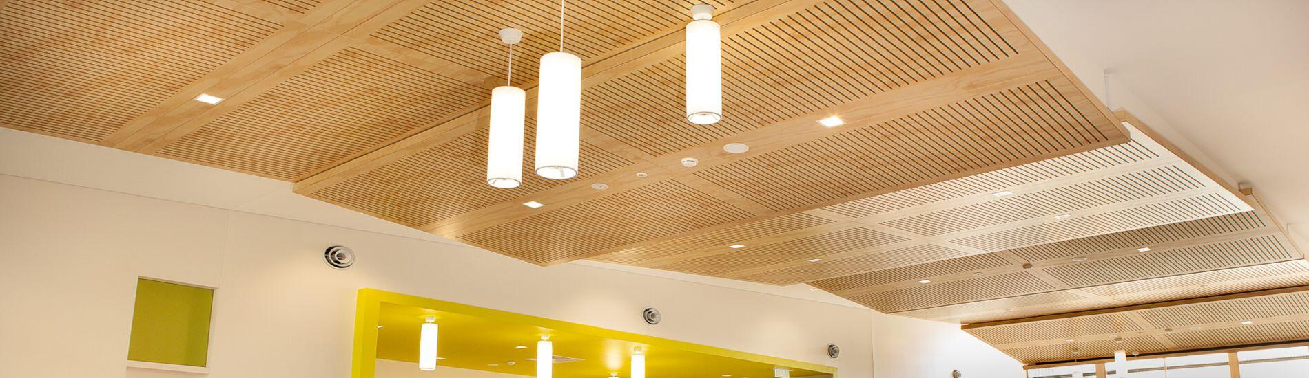 Floating SUPACOUSTIC Acoustic Slotted Panel Ceiling Feature Meets FR Compliance For Uni Reception Area