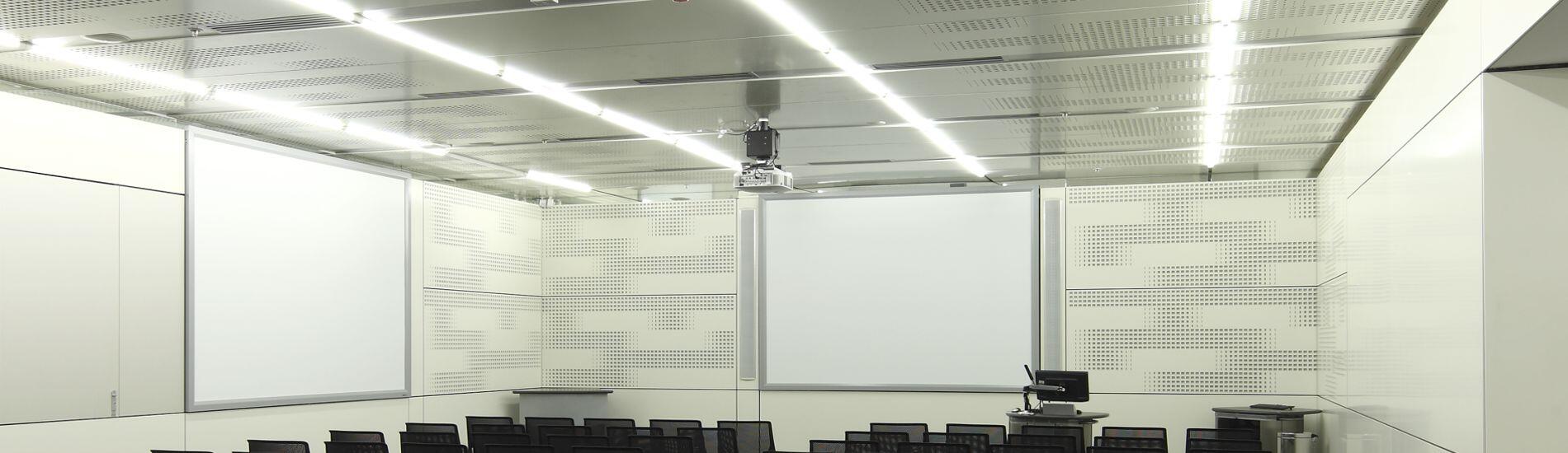 SUPACOUSTIC custom perforated acoustic wall and ceiling panels for teaching facility
