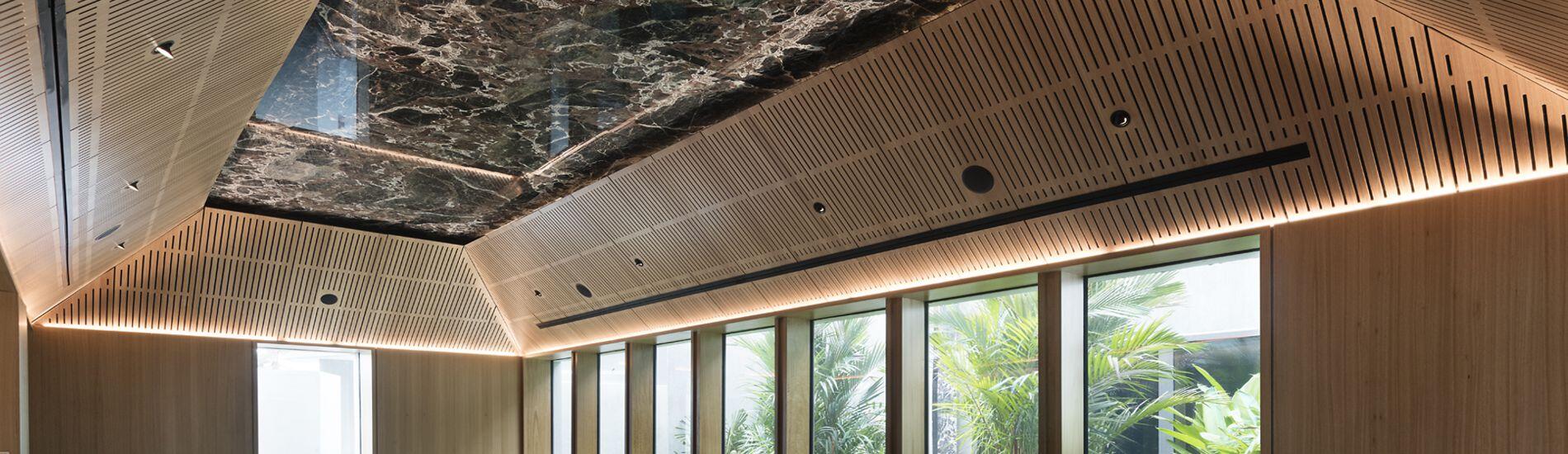 Mix of SUPACOUSTIC Acoustic Panels and Lightweight MAXI BEAM Throughout Embassy