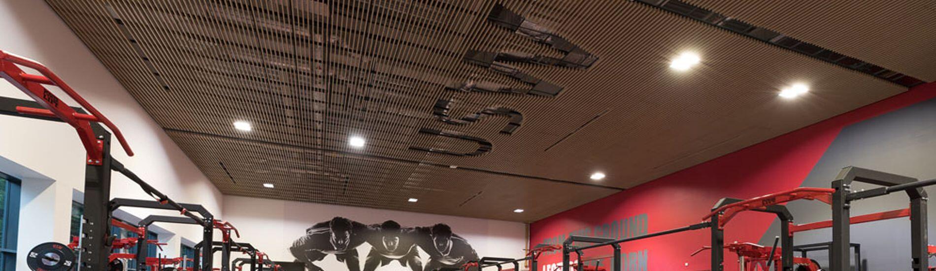 SUPATILE SLAT Ceiling Tiles Incorporate Branding In Gym Ceiling