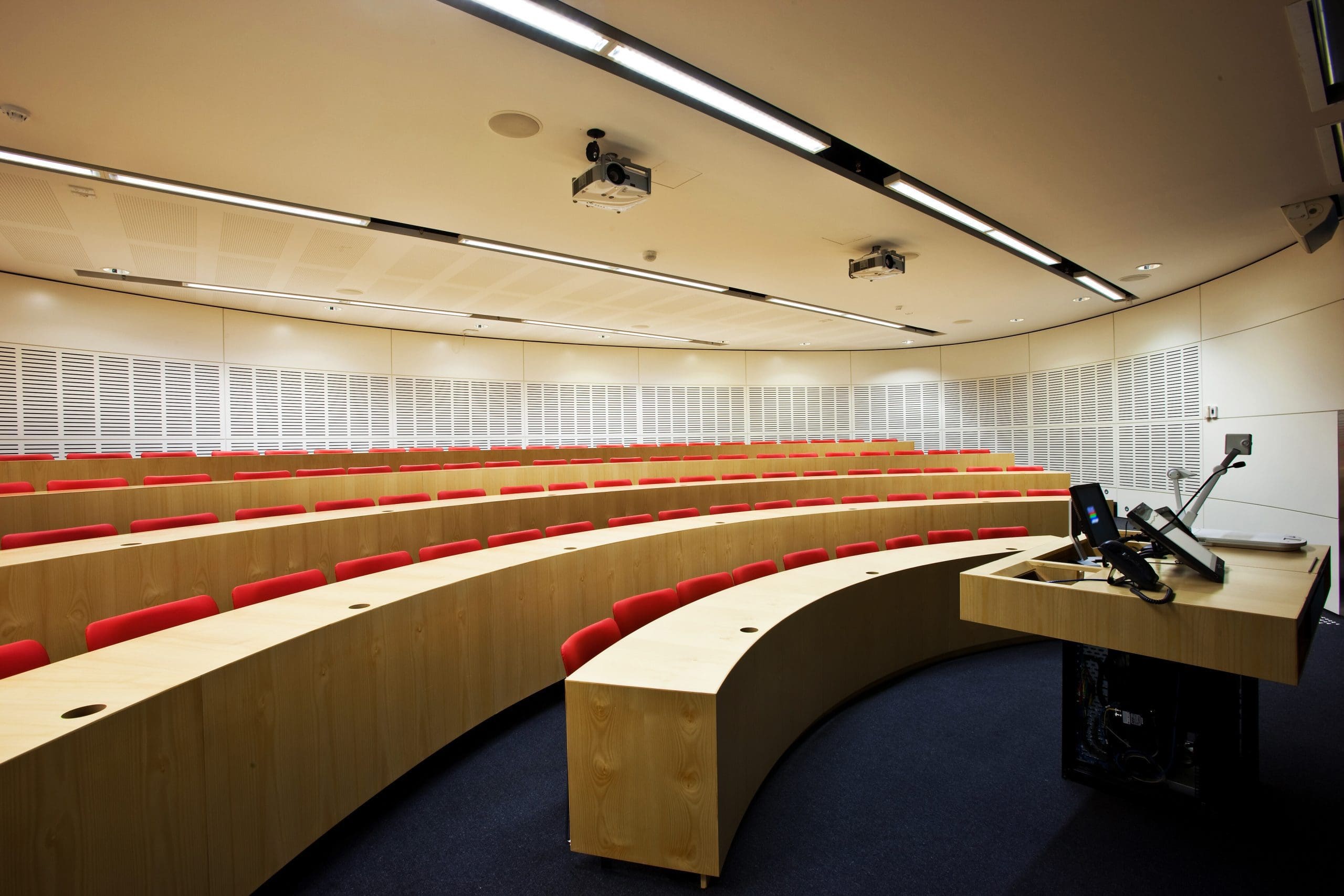 SUPACOUSTIC slotted acoustic panel wall in a lecture theatre at Faculty of Law, University of Sydney